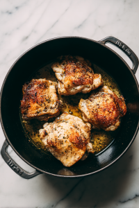 searing-jerk-chicken-in-dutch-oven-skin-side-up