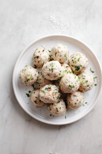 shaped-greek-chicken-meatballs-on-white-plate