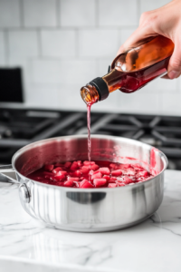 stirring-in-vanilla-essence-in-the-boiling-rhubarb-filling-mixture