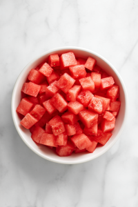 white-ceramic-dish-arranged-watermelon-clean-marble