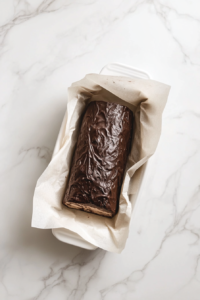 wrapped-swiss-roll-log-in-glass-dish-refrigerator-ready