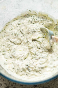 In a small bowl, whisk together the Greek yogurt