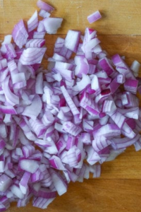 Chopping the onion into small dice. Set aside.
