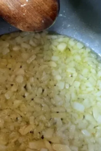 Sauté the diced onion in a skillet