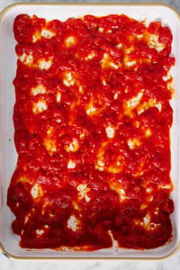 Spread a thin layer of vegetable sauce