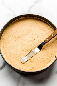 Pour the filling over the chilled crust