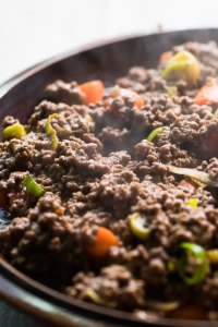 Spread the beef mixture evenly in a baking dish