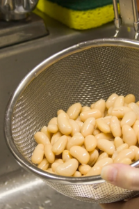 Drain and rinse the canned beans
