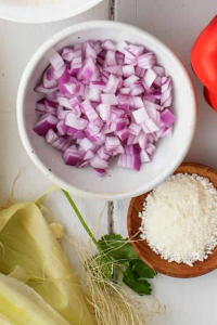 Place the finely chopped red onion