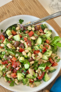 Pour the warm oil over the beans