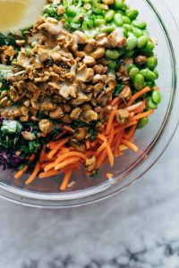 Toss chopped greens, shredded carrots
