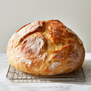 Carefully place the dough into the hot Dutch oven